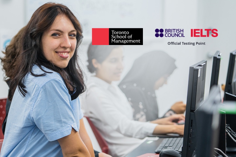 Happy Students taking test on their computer system